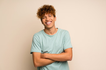 African american man with green shirt smiling