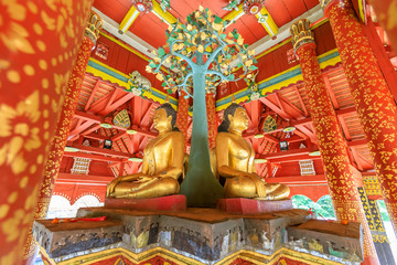 Four Buddha sculpures in pavilion at Wat Pong Sanuk temple and museum in Lampang, North of Thailand