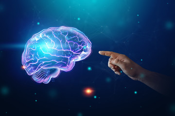 The image of the human brain, a hologram, a dark background. The concept of artificial...