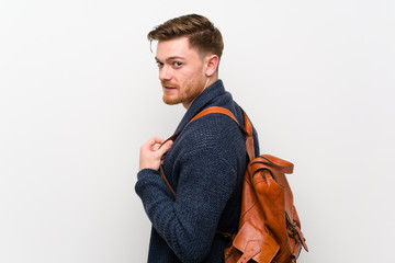 Redhead man with backpack