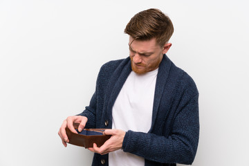 Redhead man holding a wallet
