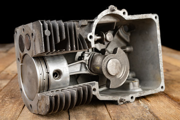 A four-stroke gasoline engine in section. The interior of a single-cylinder internal combustion...