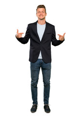 Blonde handsome man proud and self-satisfied