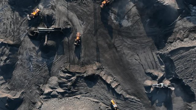 Open pit mine, extractive industry for coal, top view aerial drone
