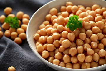 Fresh raw chickpeas in white bowl. Healthy food