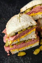 New York pastrami, gherkins and sourdough bread deli sandwich