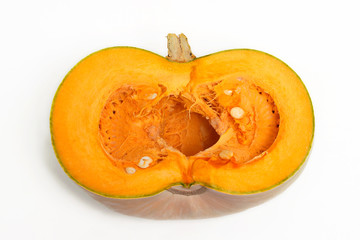 Half a pumpkin isolated on a white background. Top view.