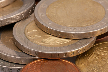 Money coins background. Euro coins with patina. Selective focus