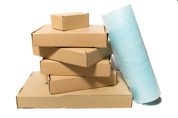 pile of various size boxes and bubble packing material