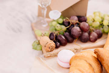 grapes, bread and champagne cork