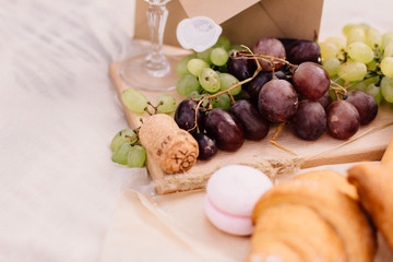 grapes, bread and champagne cork