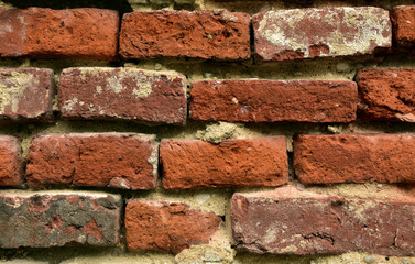 Rote alte Mauersteine als Hintergrund