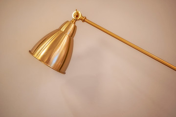 Golden desk lamp light modern copper background