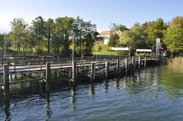 Fototapeta na wymiar Wooden dock on Chiemsee Island, Germany 