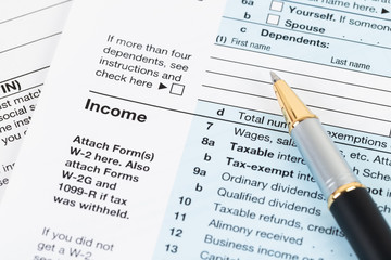 Fototapeta premium Individual income tax returm form by IRS, concept for taxation