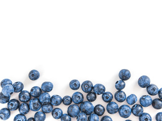 Creative layout with fresh ripe berries. Blueberry isolated on white background with copy space. Can use for your design, promo, social media. Top view.