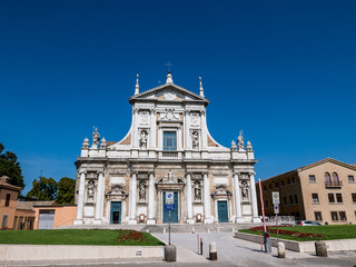 Fototapeta na wymiar The basilica of Santa Maria in Porto with a rich facade from the 18th century in Ravenna, Italy