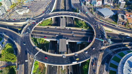 Aerial drone photo of multilevel highway junction urban ring crossing road during rush hour