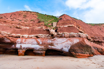 Rocks undercut by the sea at Orcombe Point, Exmouth, Devon, UK
