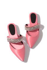 Trendy satin pink crystal embellished mules isolated on white, harsh light