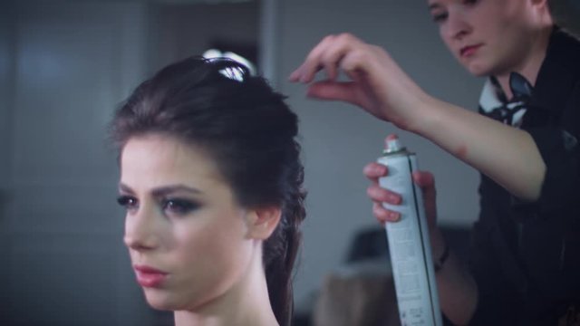 4k Model in Hair Studio, Hairdresser Finishing the Hairstyle 