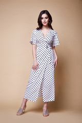 Pretty beautiful sexy elegance woman skin tan body fashion model glamor pose wear trend dress...