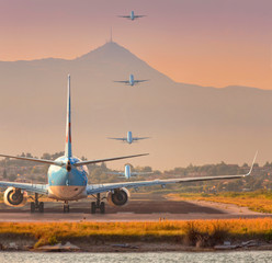 Fototapeta na wymiar Airplane taking off. A big passenger or cargo aircraft, airline flying. Transportation.