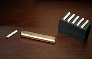 electronic smoke device wooden clock table nobody 