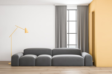 White and yellow living room with sofa