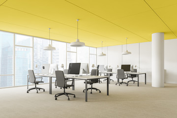 Yellow ceiling open space office corner