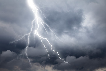 Thunderstorm lightning with dark cloudy sky - 261612270