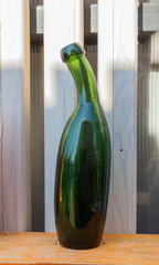 Ancient curved bottle