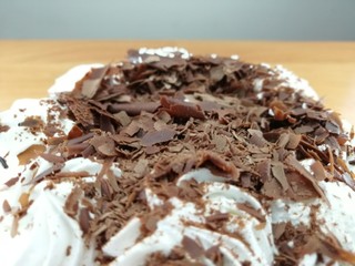 chocolate cake with cream and sweets