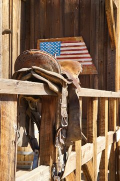 Old Saddle Of A Horse With American Flag