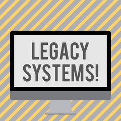 Conceptual hand writing showing Legacy Systems. Concept meaning old method technology computer system or application program White Computer Monitor WideScreen on a Stand for Technology
