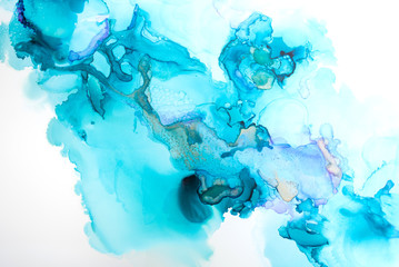 Colorful alcohol ink texture with abstract washes and paint stains on the white paper background.	