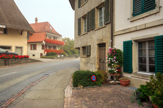 Old residential neighborhood on a foggy autumn day. Villigen, Switzerland.