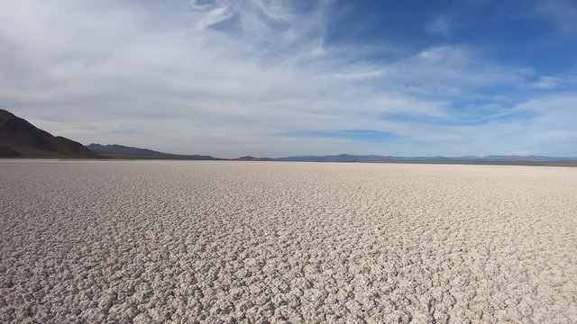 Crusty textured surface of Soda Dry Lake near Zzyzx and Baker in the Mojave desert area of Southern California.  