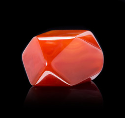 Stone carnelian on a black background