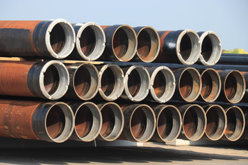 Rusty stacked pipes