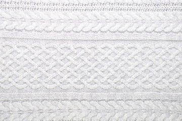 knitting and needlework: patterned knitted fabric, short focus