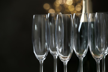 Empty champagne glasses on blurred background, closeup