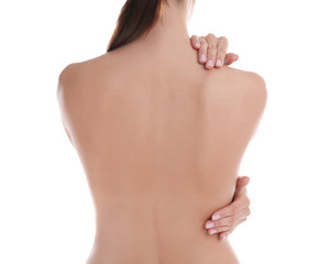 Woman with perfect smooth skin on white background, back view. Beauty and body care