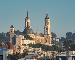 Saint Ignatius Church in San Francisco, viewed from the north west.  Evening sun from the west, clear blue sky.