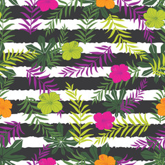 Vector tropical flowers and fern leaves on stripes background. Suitable for gift wrap, textile and wallpaper.