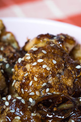 general tso cauliflower with chicken breast consist of fried cauliflower in sourly soy sauce 