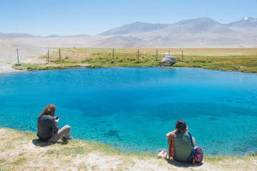 Fototapeta premium Pamir Mountains, Tajikistan - Aug 21 2018: Ak Balyk Lake in Gorno-Badakhshan, Tajikistan. It is located in the World Heritage Site Tajik National Park (Mountains of the Pamirs).