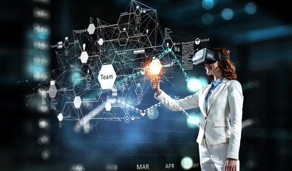 Young female in virtual reality. Mixed media