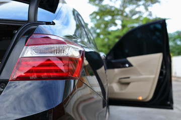 red taillight of black modern sport car
