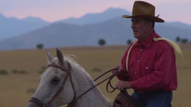 Slow Motion Rustic Cowboy Galloping on Horseback